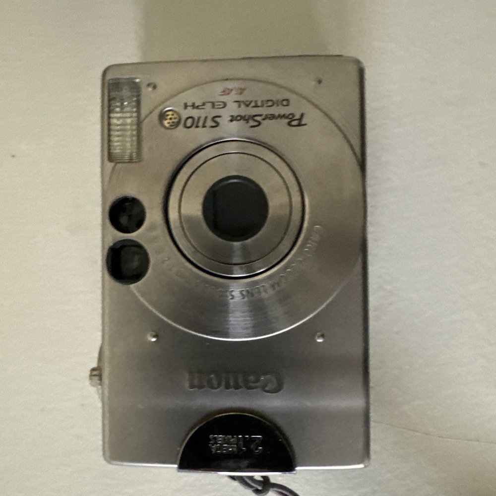Canon Digital Camera IXUS V 2.1MP Silver Point and Shoot Auto Focus PC1012
